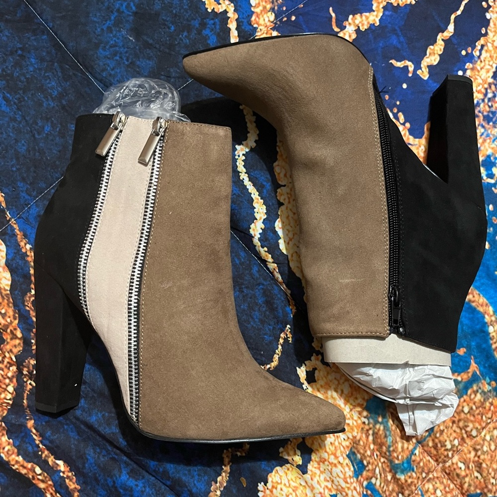 Beige and black suede zip up booties
